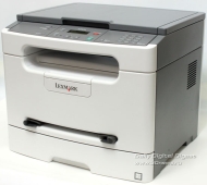 Lexmark X203n - Multifunction ( printer / copier / scanner ) - B/W - laser - copying (up to): 23 ppm - printing (up to): 23 ppm - 250 sheets - Hi-Spee