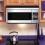 Sharp R-1874 - Microwave oven with built-in exhaust system - over-range - 31.1 litres - 850 W - stainless steel
